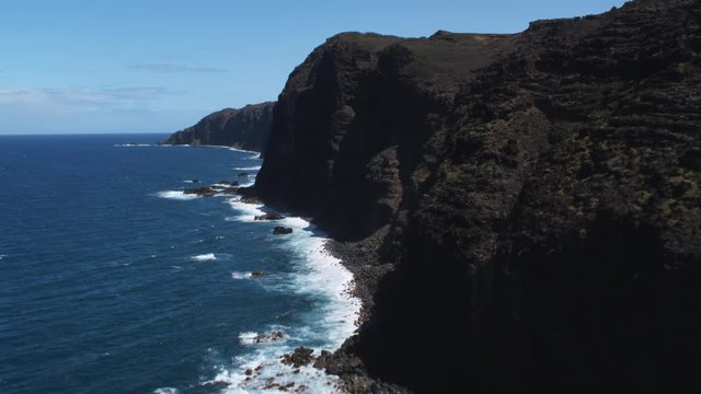 Over cliffs at the edge of Molokai's shoreline. Shot in 2010.