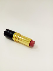 pink colored lipstick  isolated on white background.