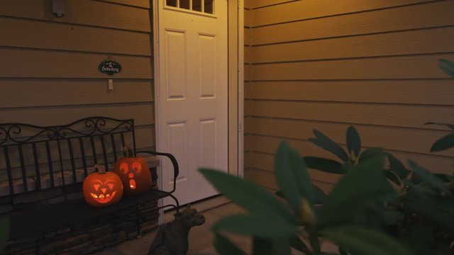 Front porch with jack-o-lanterns