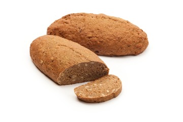 Yeastless loaf with sunflower seeds on white background