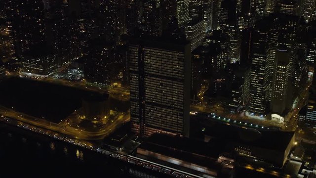 Above New York's East River at night, UN Building in foreground. Shot in November 2011.