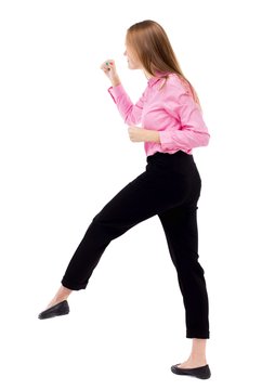 skinny woman funny fights waving his arms and legs.