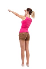 Back view of  pointing woman.