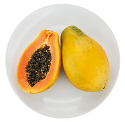 Papaya on a plate, white background