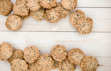 close up view cookies over wooden background