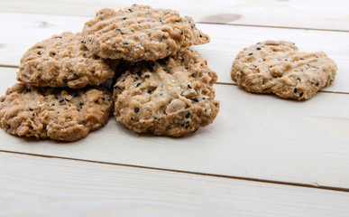 close up view cookies over wooden background