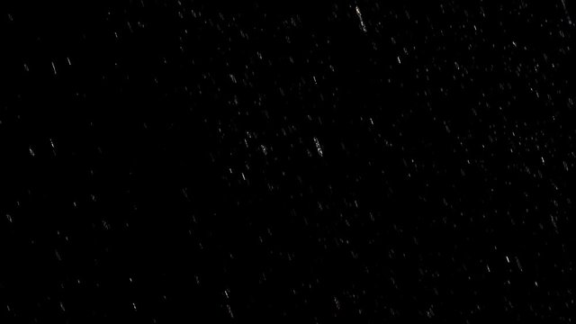 Falling raindrops footage animation in slow motion on black background, black and white luminance matte, seamlessly looped rain animation, perfect for film, digital composition, projection mapping