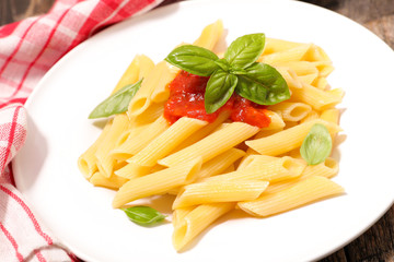 pasta with tomato sauce and basil