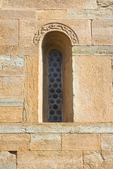 Detail of lancet window in a medieval italian church