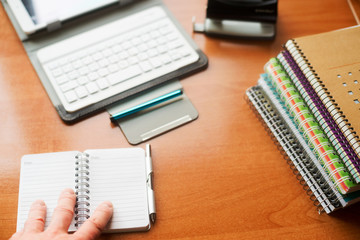Office desk table with computer, supplies. Copy space for text