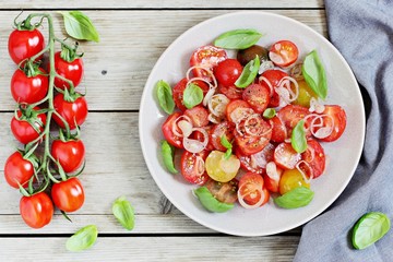 Tomatoes salad with basil and shallot. Concept of healthy eating.Selective focus