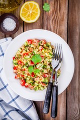 homemade tabbouleh salad with quinoa and vegetables