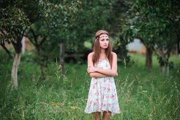 Cute girl with a wreath on head