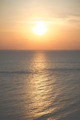 Beautiful morning sun light a long the sea background. (Vintage filtered)