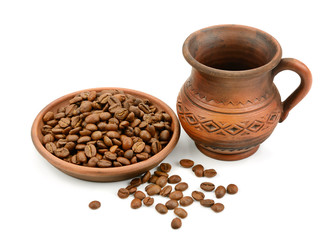 ceramic cup of coffee beans isolated on white background