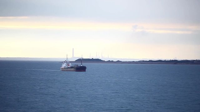 Color footage of a ship sailing on the sea.