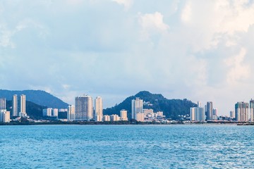 Naklejka premium Tanjung Bungah high rise building view with mountain and sea, Penang Malaysia