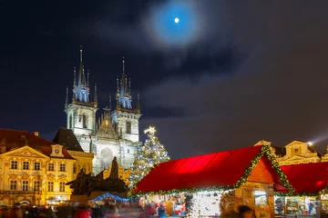 Deurstickers Old Town Square with Christmas market, tree and fairy tale Church of our Lady Tyn in the magical city of Prague at night, Czech Republic © Kavalenkava