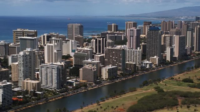Flying past high-rises along Honolulu's Waikiki Beach. Shot in 2010.