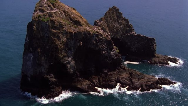 Flying around Mack Arch rock on the Oregon coast