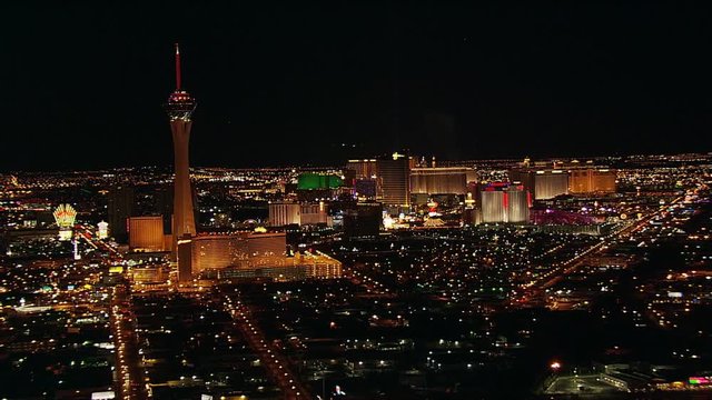 Wide aerial view of Las Vegas at night, looking toward Stratosphere. Shot in 2005.