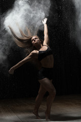 Obraz na płótnie Canvas Girl dancing with a flour