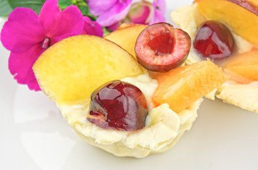 Pastries with cream and fresh fruits