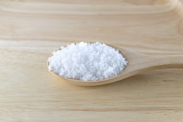Fototapeta na wymiar Salt in wooden spoon
