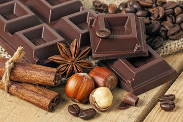 Chocolate with wood background - food