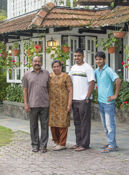 Family/A Photo Of The Owner Of A Small But Cozy Hotel And His Family