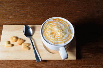 Latte Coffee art and Dessert sort the word LOVE the wooden