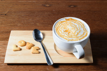 Latte Coffee art and Dessert sort the word LOVE the wooden