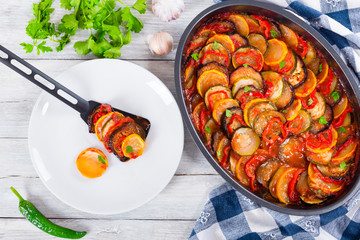 Layered ratatouille in a baking dish, top view