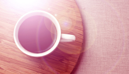 Black coffee in white cup, with copyspace, in morning light