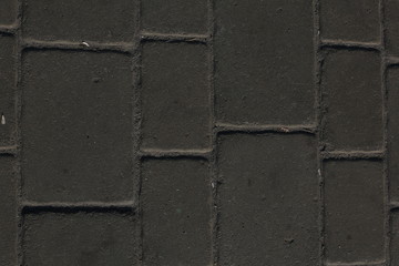 Black stone brick wall texture or background