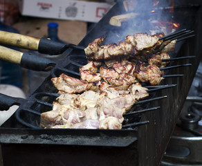 Street food, meat on the grill