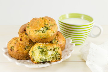 Corn bread with spinach on a wooden table