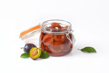Plum compote in jar