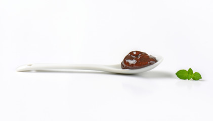 spoon of plum jam