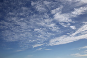 Fantastic soft white clouds against blue sky