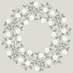 Decorative round frame with white flowers and leaves