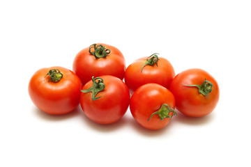 ripe tomatoes closeup isolated on white background