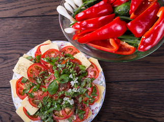 Vegetarian salad with cheese and tomatoes