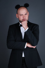 Portrait stylish and brutal bald man with a beard