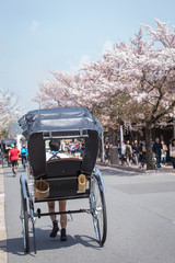 Unidentified people pulled rickshaws