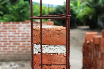 Clay orange bricks for a rural building