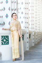 Thai woman wearing Thai traditional bridal dresses
