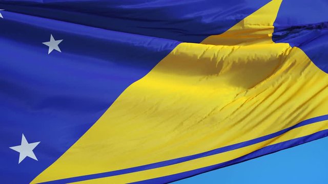 Tokelau flag waving in slow motion against clean blue sky, seamlessly looped, close up, isolated on alpha channel with black and white luminance matte, perfect for film, news, digital composition
