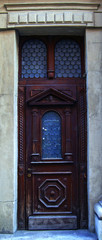 Fototapeta na wymiar old door in the city building
