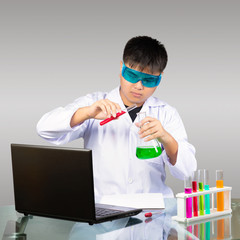 Young asian boy study chemistry, Science and chemistry education concept